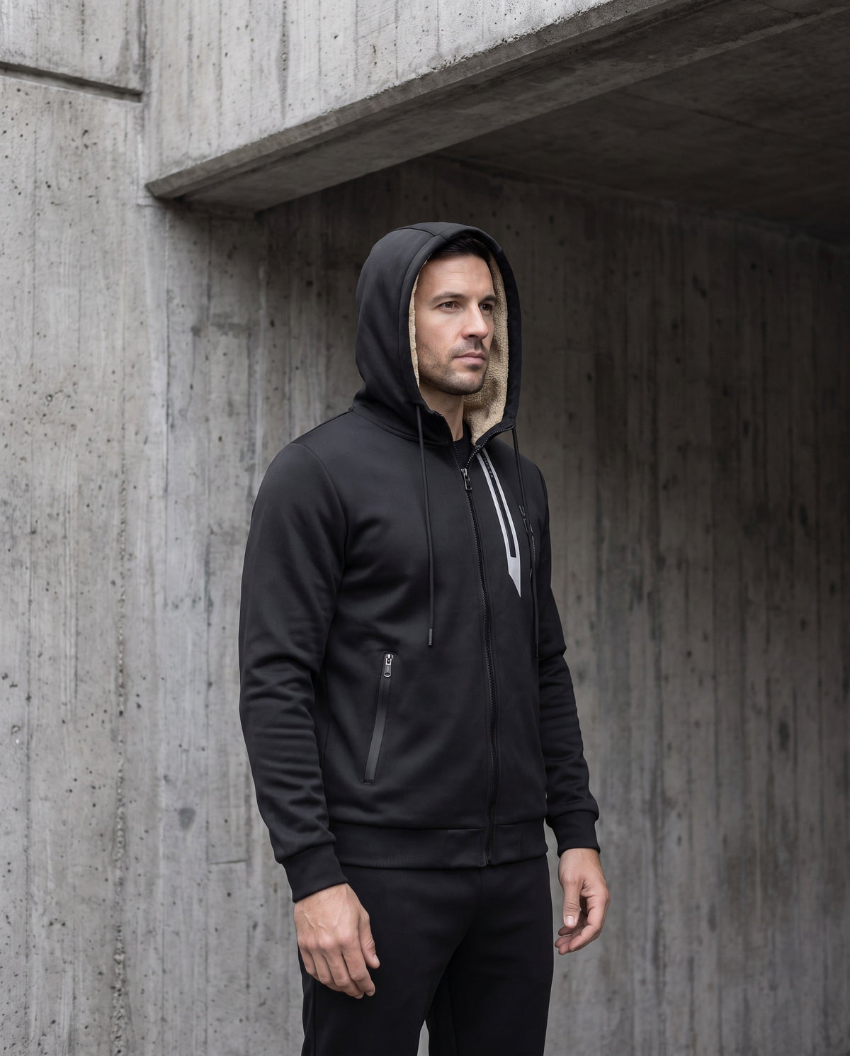 Fendrick men's sherpa-lined hooded jacket worn with the hood up