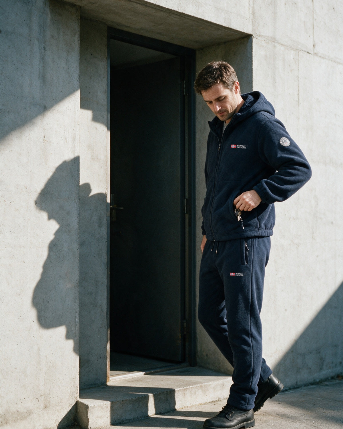 Norway Set in Navy — taking the keys out of the jacket pocket at the door